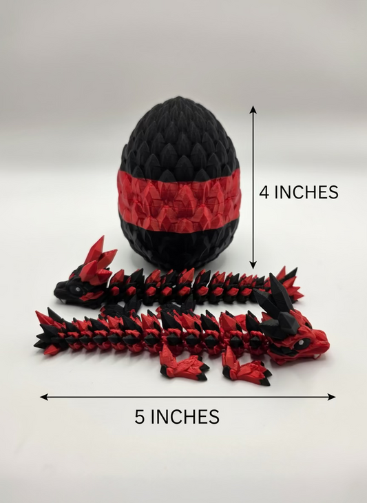 Black and red dragon egg with dragon scale design on a white background