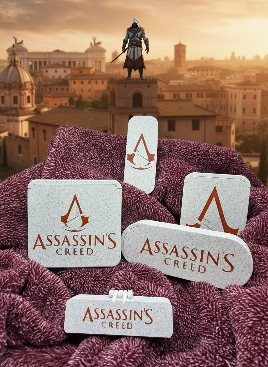 Assassin's Creed jewelry on a textured fabric background